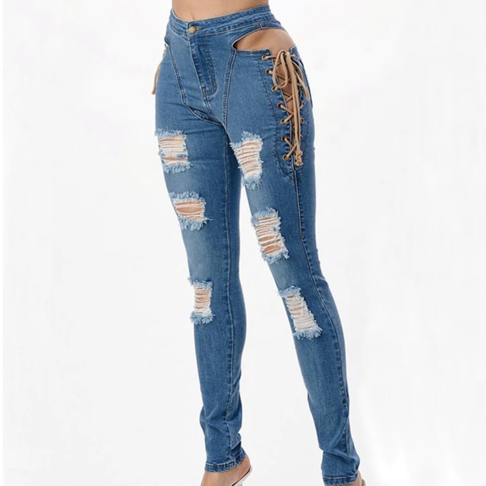 Distressed Denim jean with side tie.